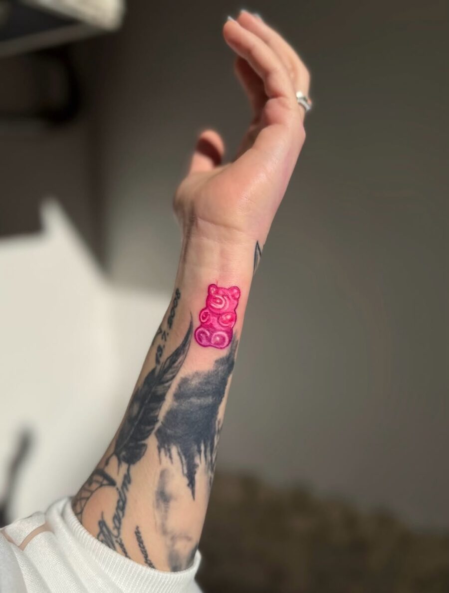Playful and vibrant gummy bear tattoo design Tattoo on skin
