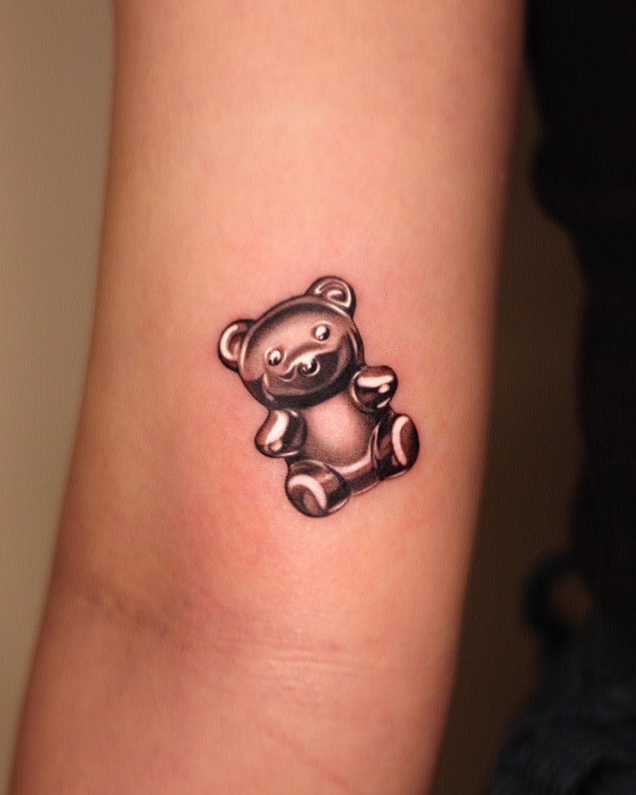 Realistic gummy bear tattoo on forearm Tattoo on skin