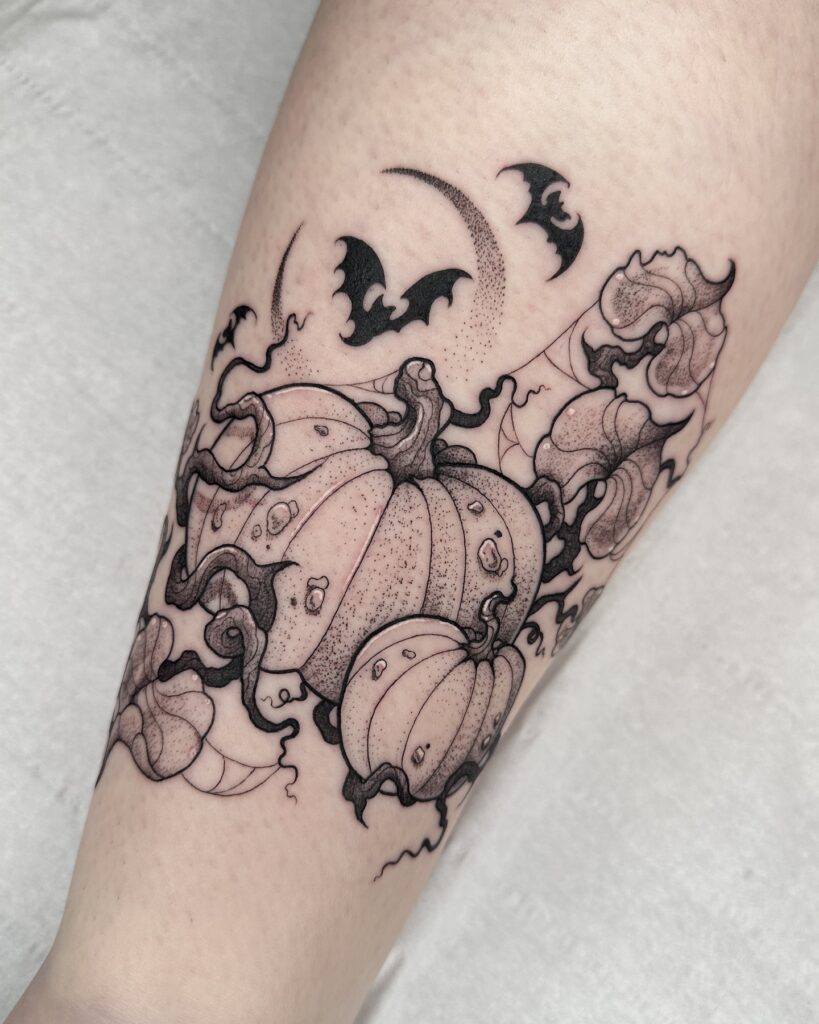 Elegant Pumpkin And Bat Halloween Tattoo halloween tattoos