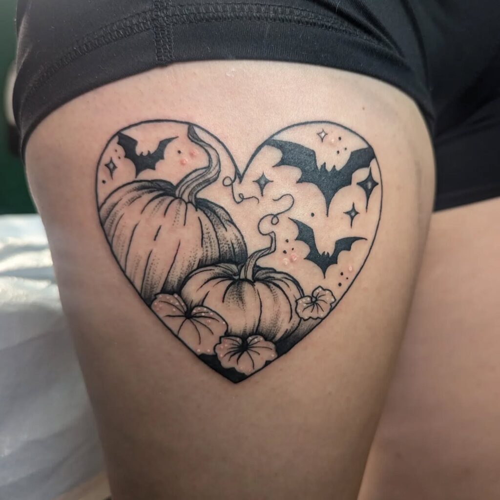 Heart-Shaped Pumpkin And Bat Tattoo halloween tattoos