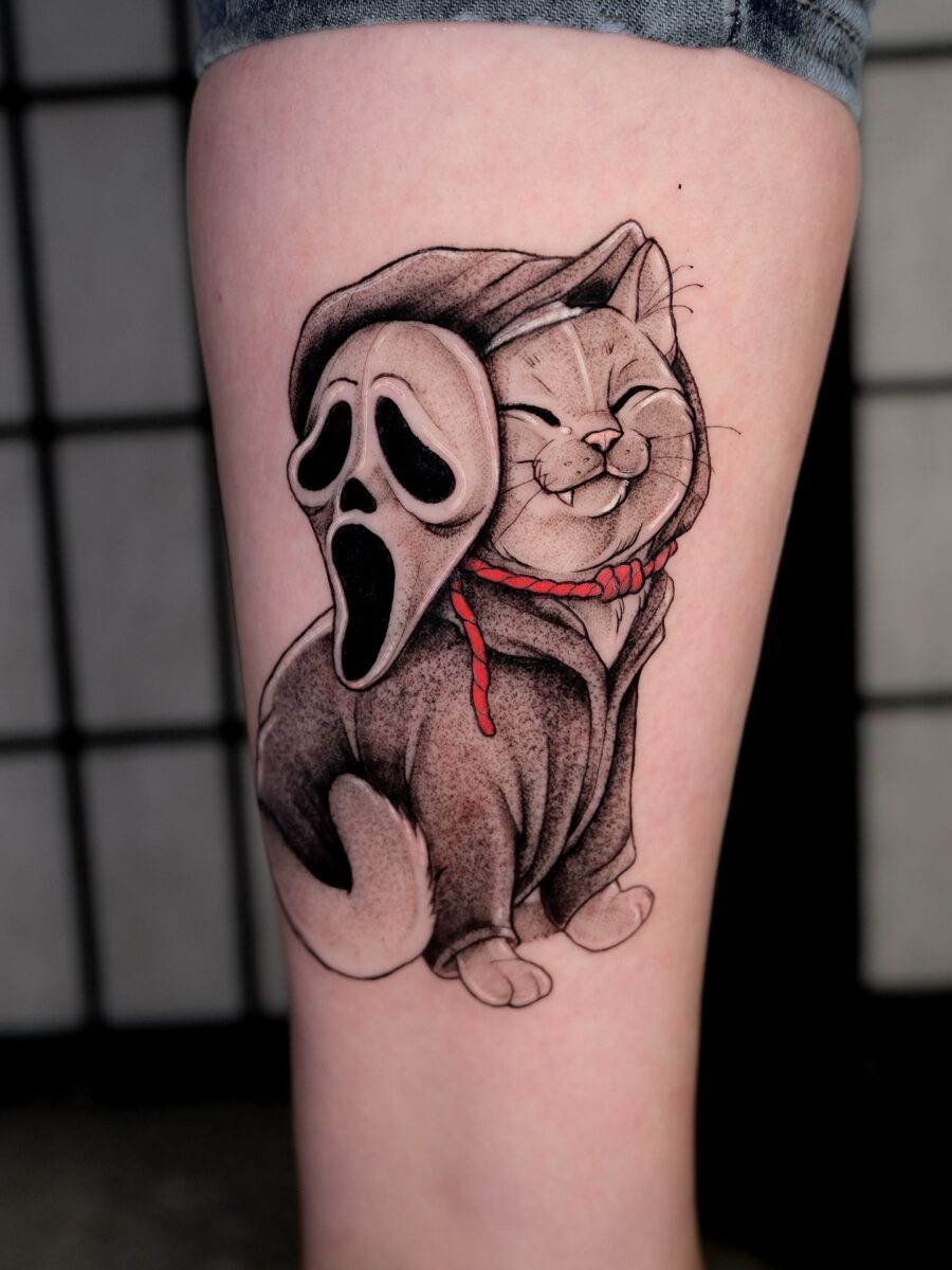 Adorable Cat Meets Iconic Ghost Face Tattoo halloween tattoos