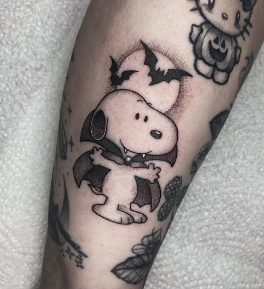 Charming Halloween Snoopy Tattoo with Bats Tattoo on skin