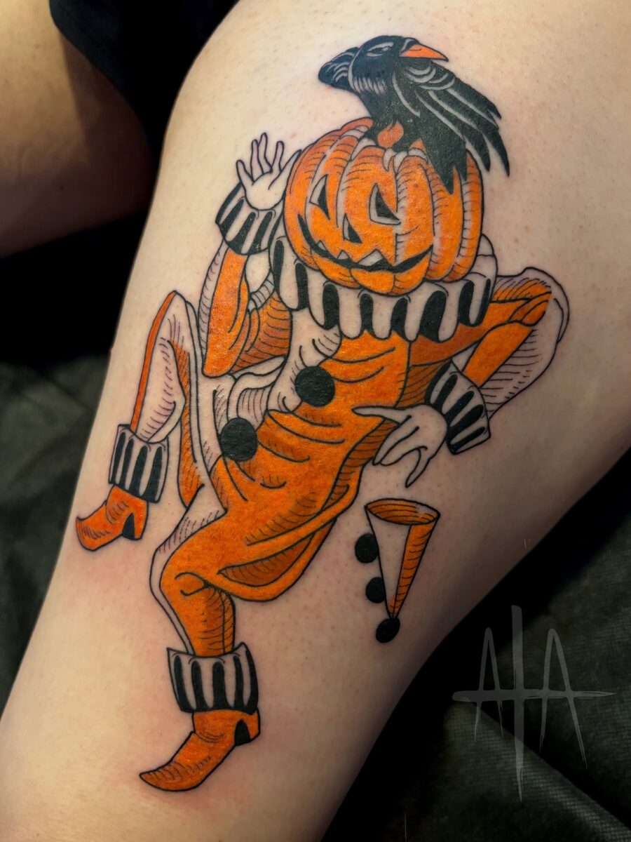 Charming pumpkin-clown tattoo for Halloween vibes Tattoo on skin