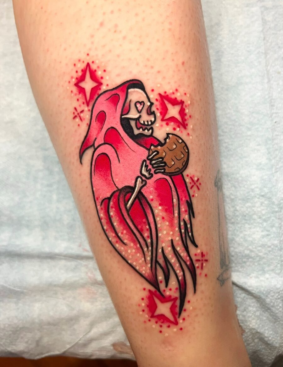 Playful ghostly skeleton tattoo with cookie theme Tattoo on skin