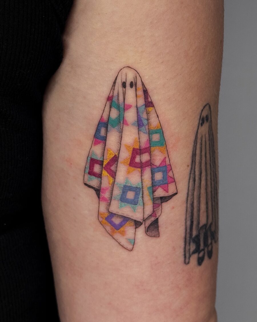 Whimsical Ghost Tattoo with Quilt Design Tattoo on skin