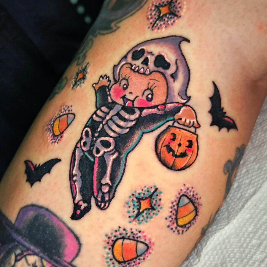 Whimsical skeleton child tattoo for Halloween fun Tattoo on skin