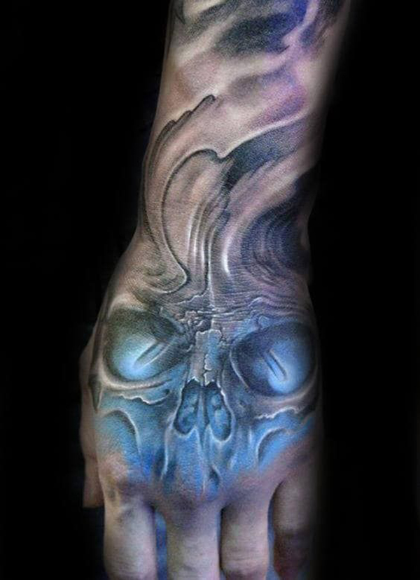 Haunting Blue Skull Hand Tattoo Ideas Tattoo on skin