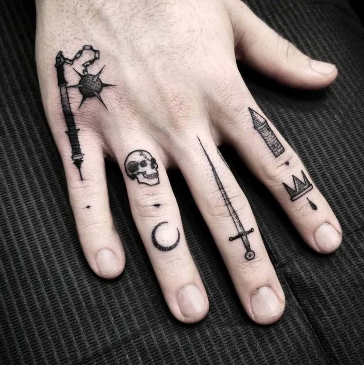 Medieval Hand and Finger Tattoos Tattoo on skin