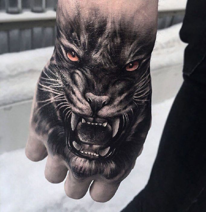 Realistic Growling Panther Hand Tattoo Ideas Tattoo on skin