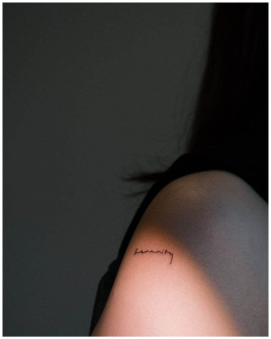 Elegant handwriting tattoo on the forearm Tattoo on skin