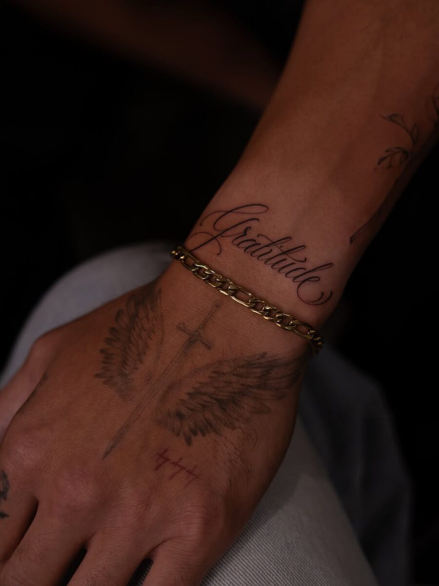 Elegant Handwritten Gratitude Tattoo Design Tattoo on skin