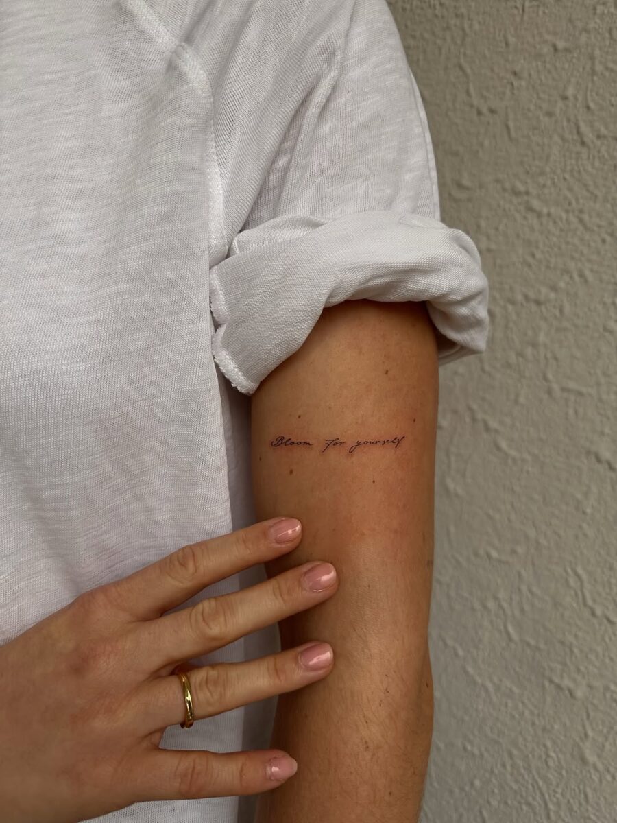 Inspirational handwriting tattoo on the arm Tattoo on skin