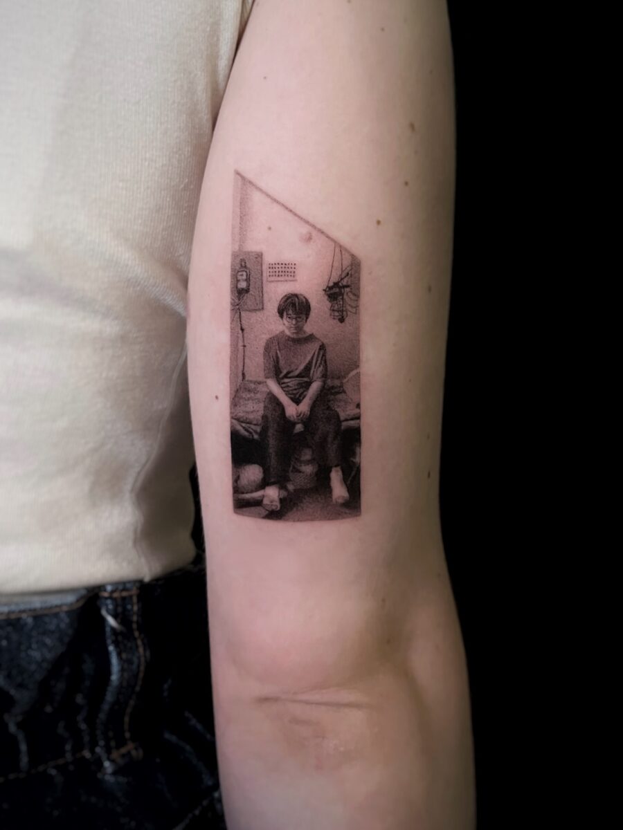 Intricate portrayal of a beloved character Tattoo on skin
