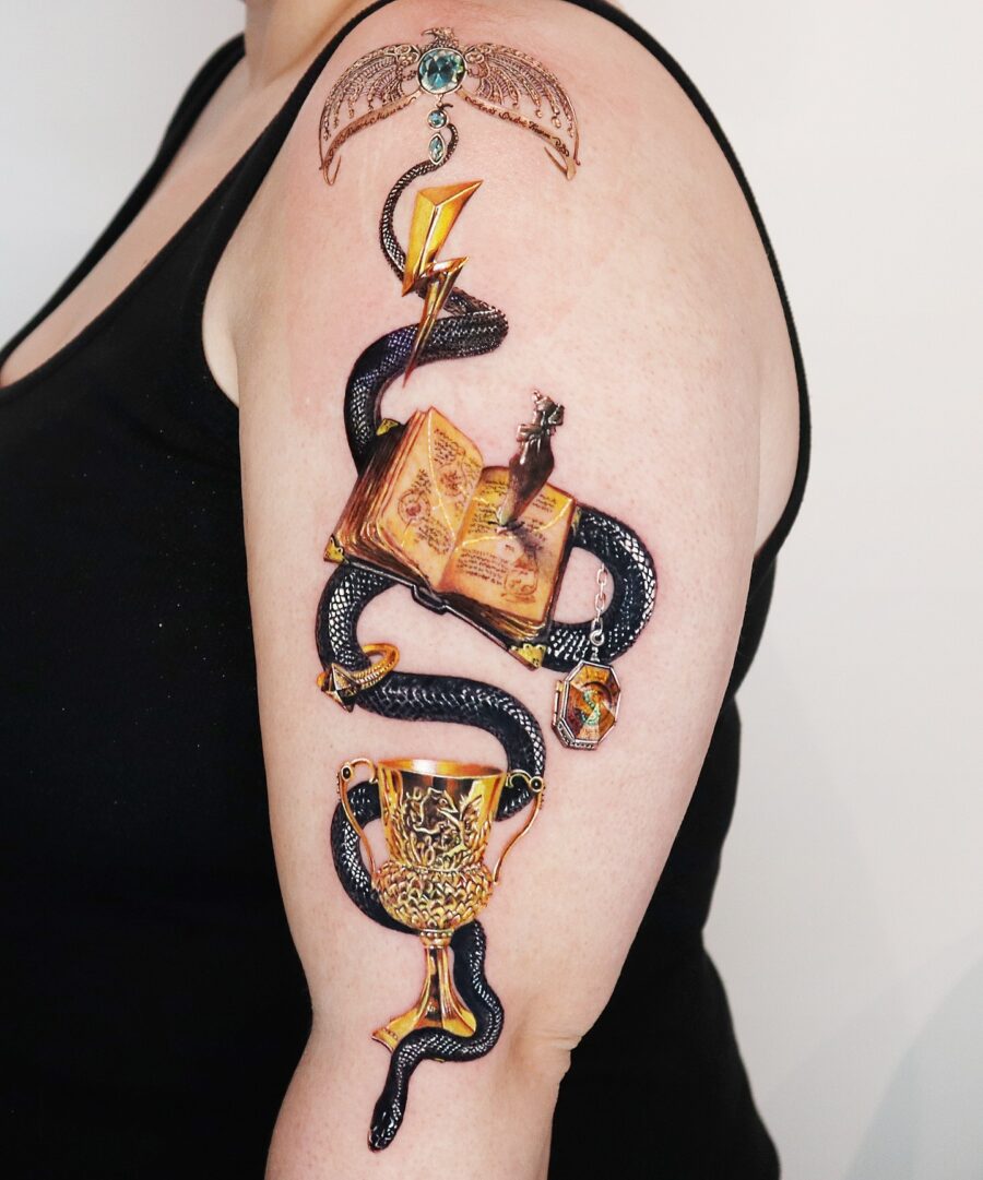 Vibrant Harry Potter Tattoo with Snake and Cup Tattoo on skin