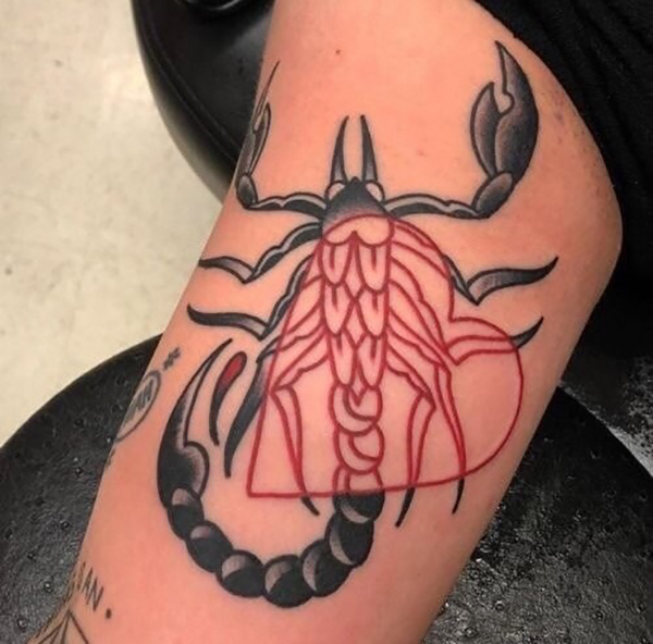 Black and Red Scorpion with An Exposed Red Heart Tattoos Tattoo on skin