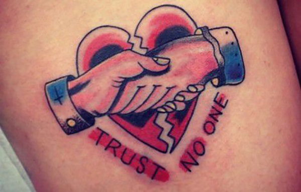 Trust No One Heart Tattoos for the Broken-Hearted Souls Tattoo on skin