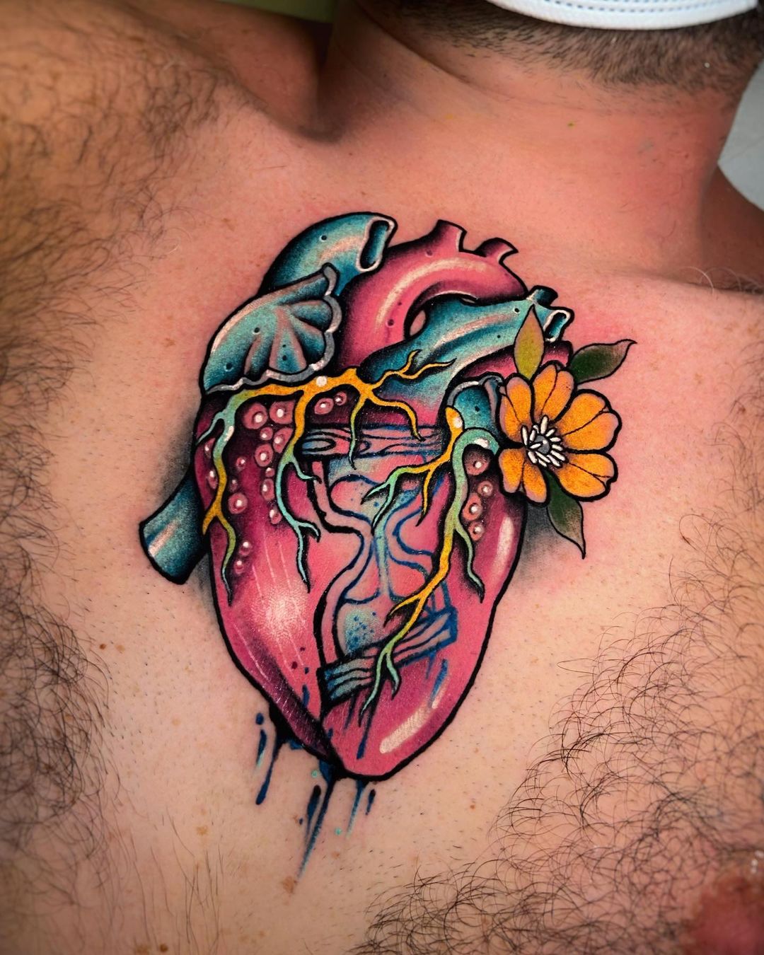 Realistic Blue-Pink Human Heart Tattoo Designs for the Raw Soul Tattoo on skin