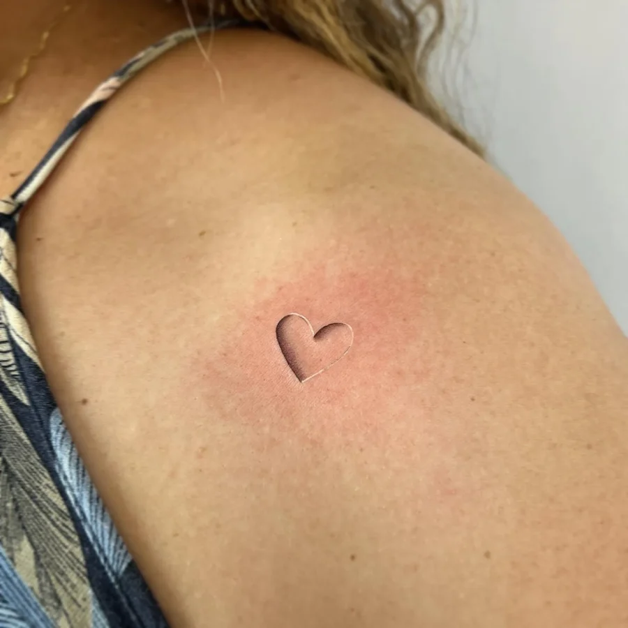 Delicate heart hidden tattoo on skin Tattoo on skin