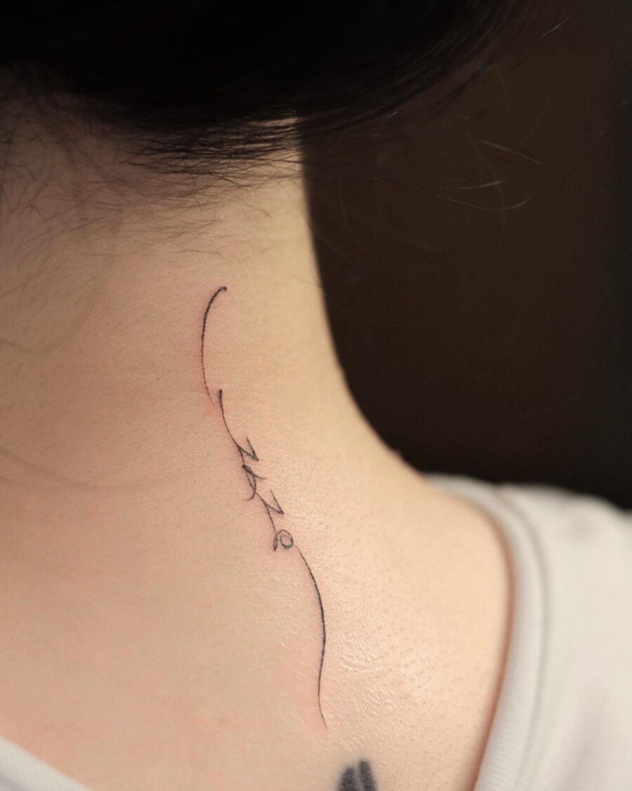 Elegant fine line tattoo on the neck Tattoo on skin