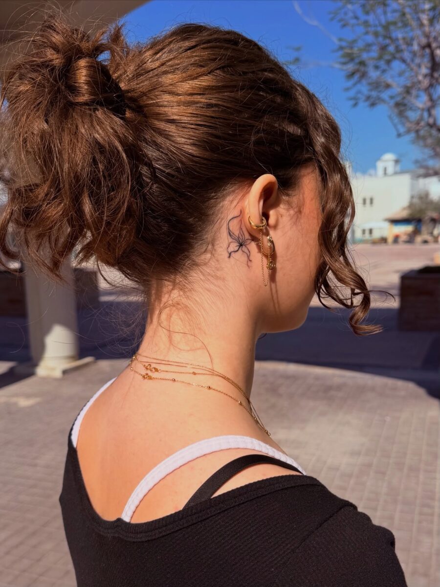 Elegant Hidden Tattoo on the Neck Tattoo on skin