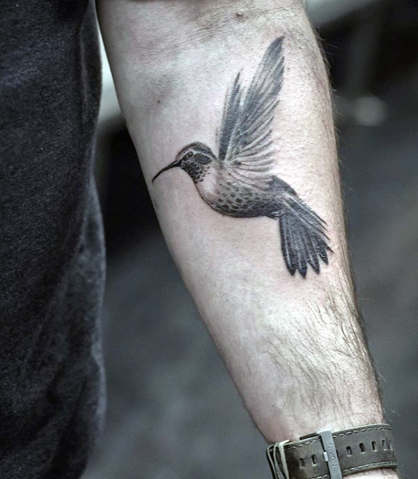 Artistic Fluttering Hummingbird Arm Tattoo Tattoo on skin