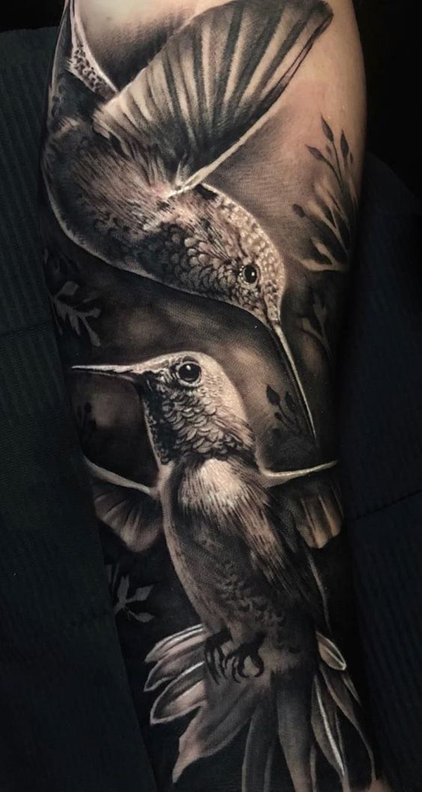Photorealistic Black & White Hummingbird Pair Tattoo on skin