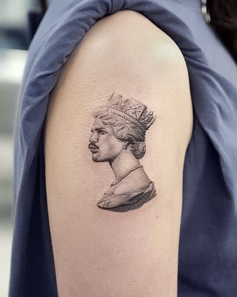 Elegant queen tattoo showcasing stunning realism Tattoo on skin