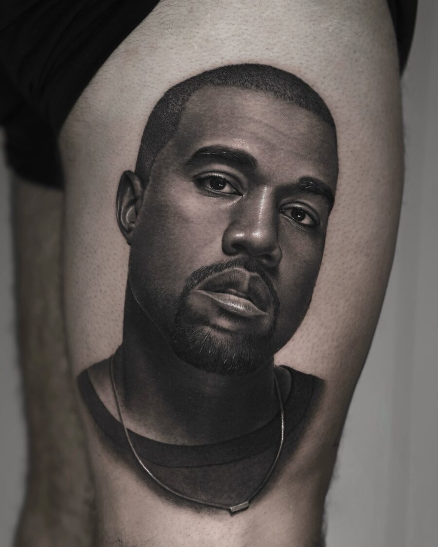 Stunning hyper-realistic portrait of Kanye West hyper realistic tattoos