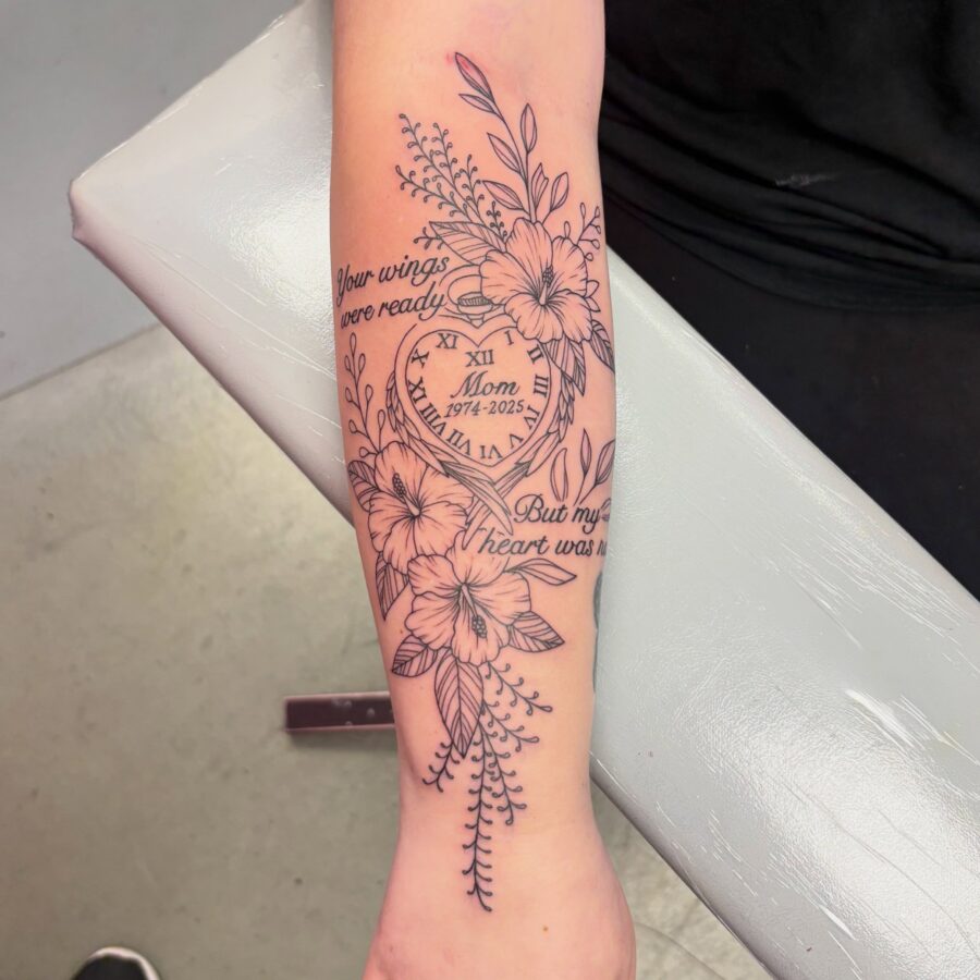Delicate floral tribute tattoo honoring a mother Tattoo on skin