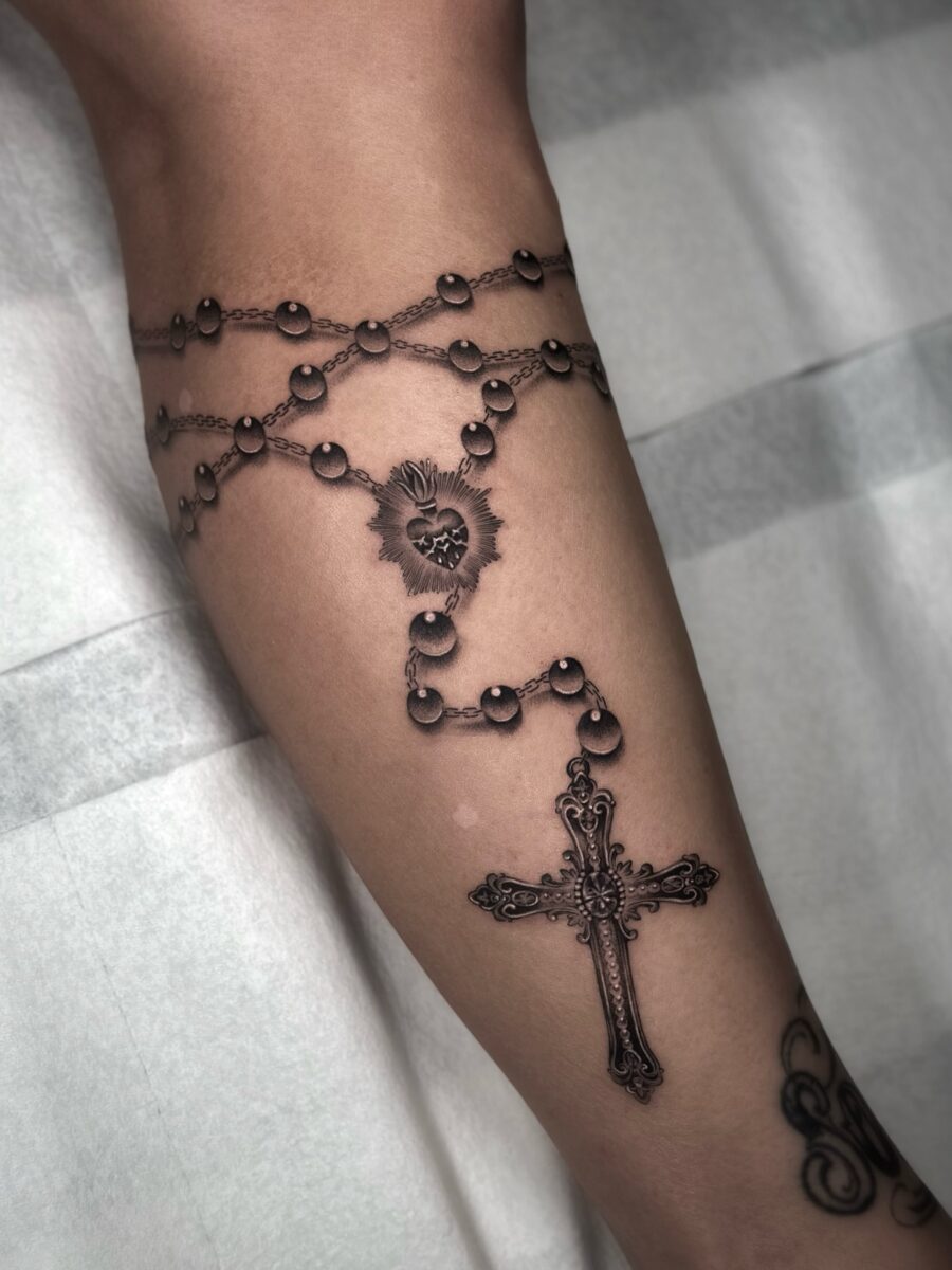 Elegant Cross and Rosary Chain Tattoo Design Tattoo on skin