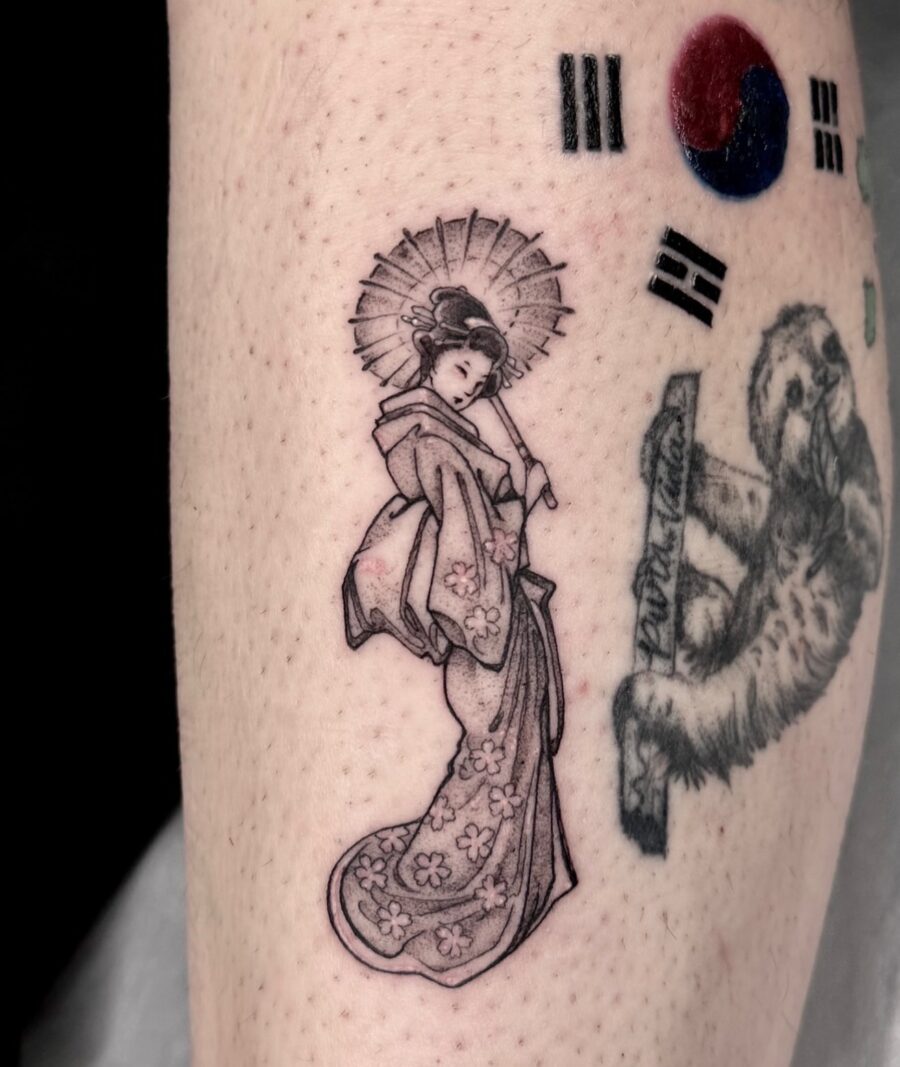 Beautiful geisha with floral kimono tattoo Tattoo on skin