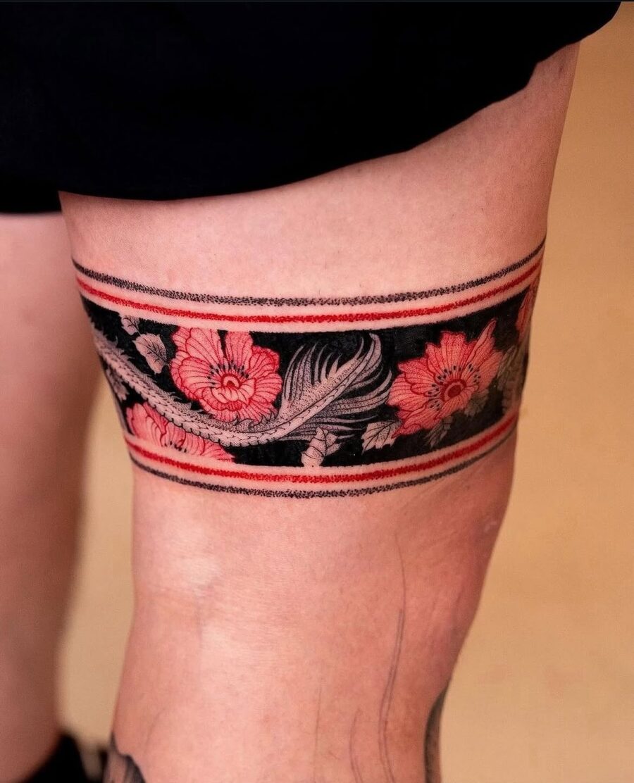 Elegant Japanese floral tattoo on the thigh Tattoo on skin