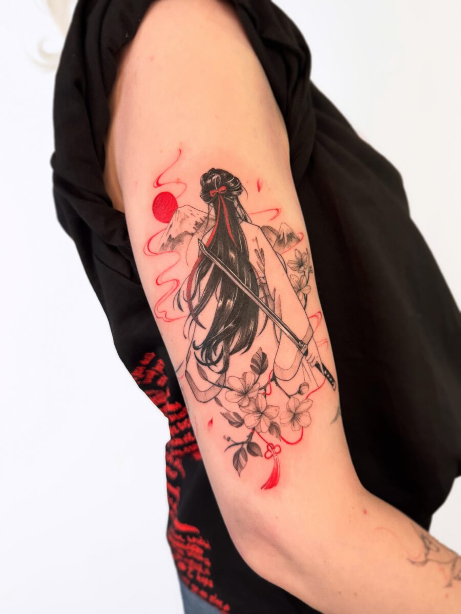 Elegant Japanese tattoo with a graceful woman Tattoo on skin