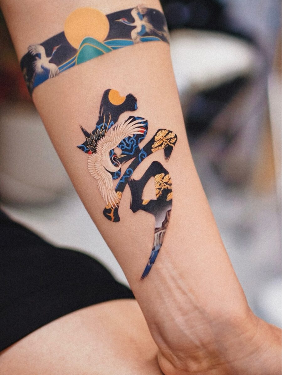 Elegant Japanese Tattoo with Crane and Waves Tattoo on skin