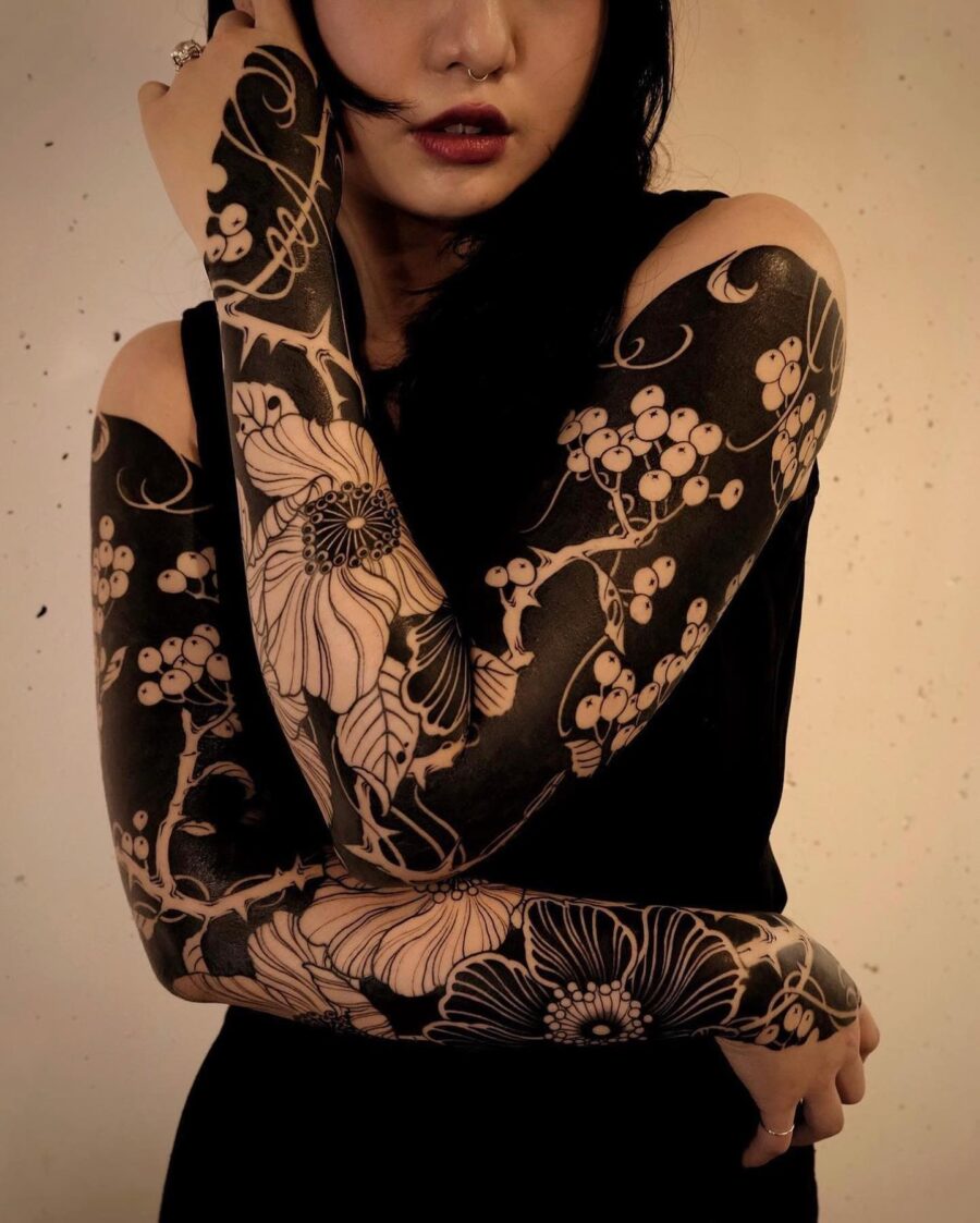 Stunning black floral sleeve tattoo design Tattoo on skin