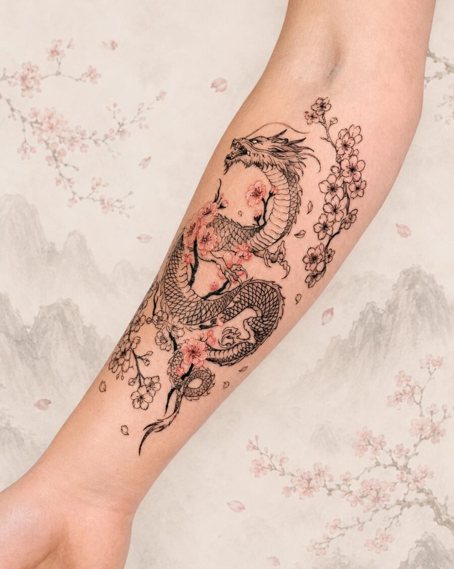 Stunning dragon and cherry blossom tattoo art Tattoo on skin