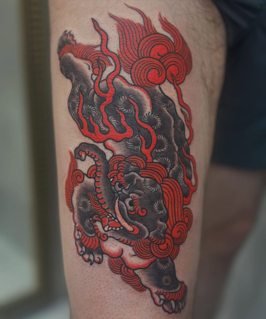 Vibrant Japanese tattoo of a fiery dragon Tattoo on skin