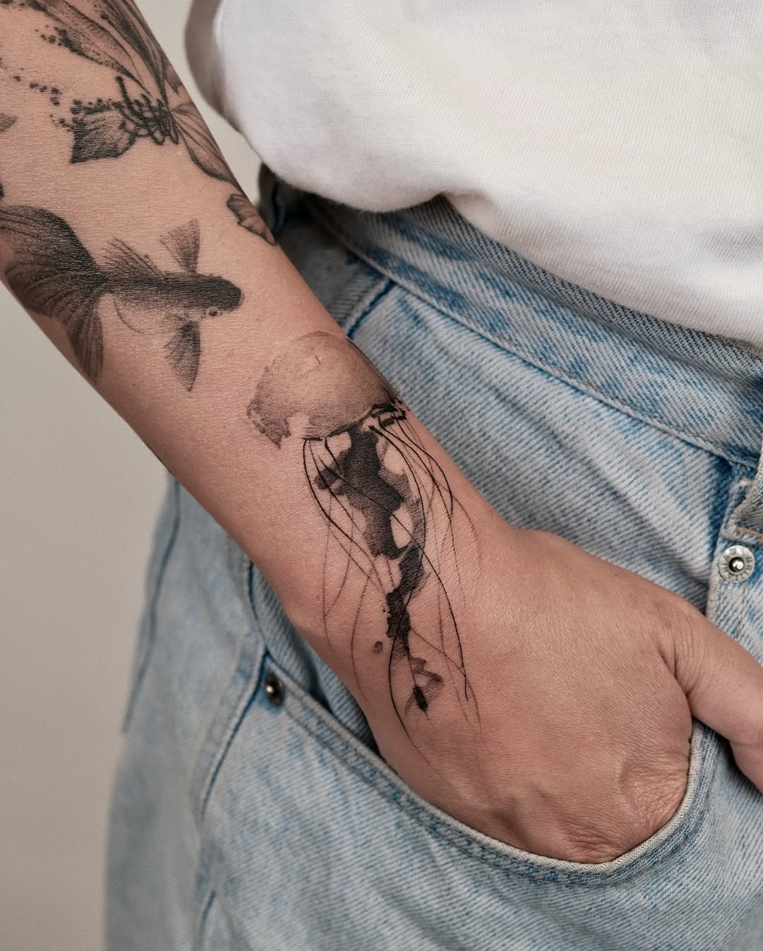 Delicate jellyfish tattoo with artistic flair Tattoo on skin