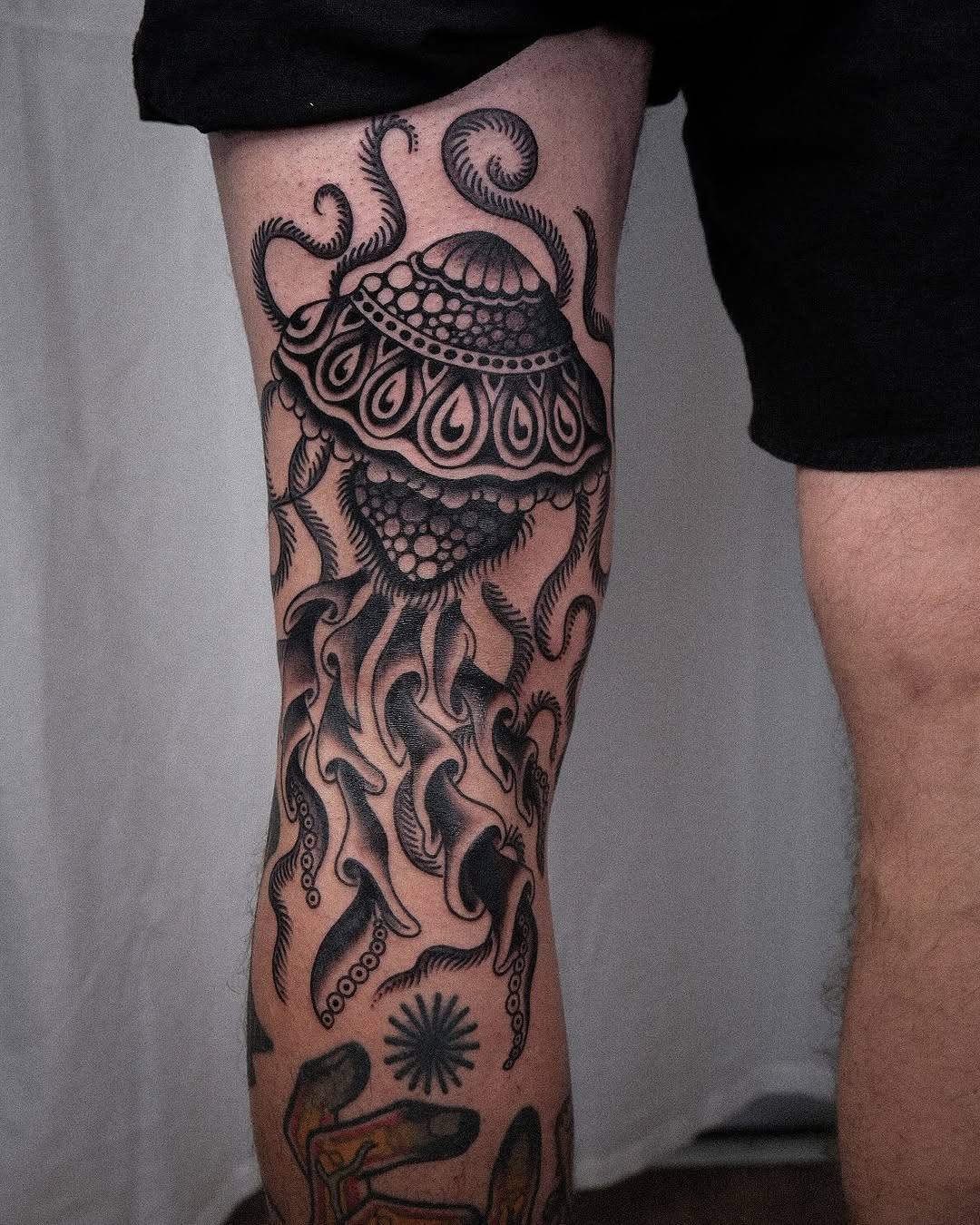 Elegant black ink jellyfish tattoo on leg jellyfish tattoos