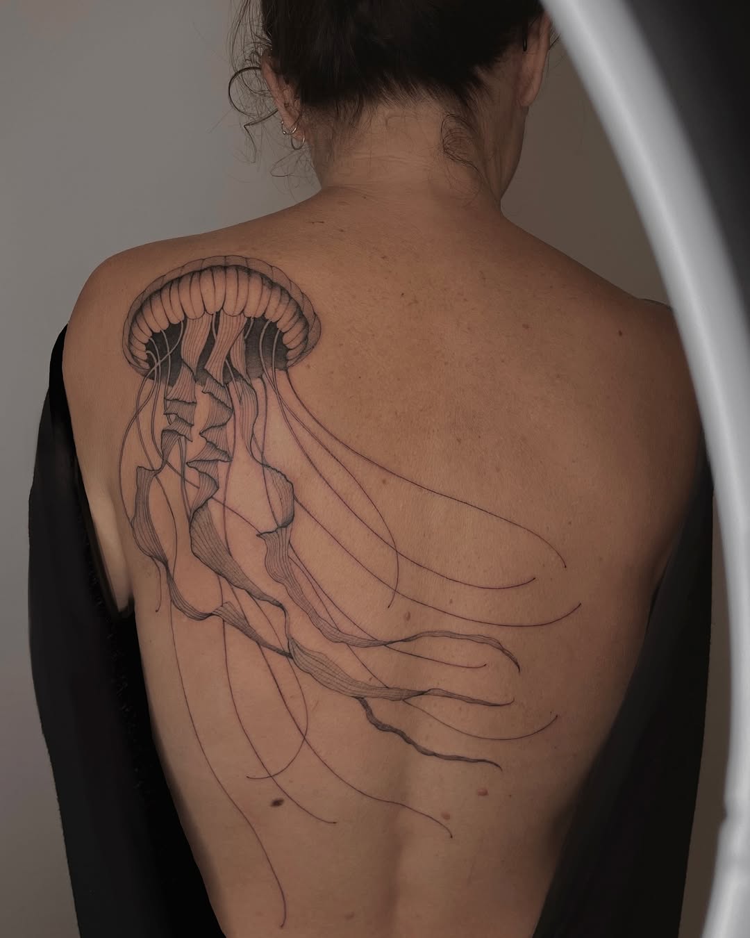 Elegant Jellyfish Tattoo on the Back Tattoo on skin