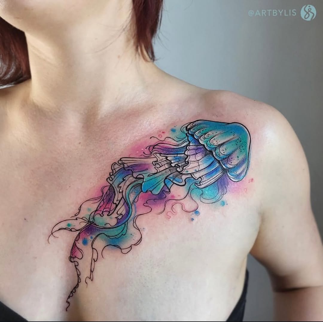 Stunning watercolor jellyfish tattoo on shoulder Tattoo on skin
