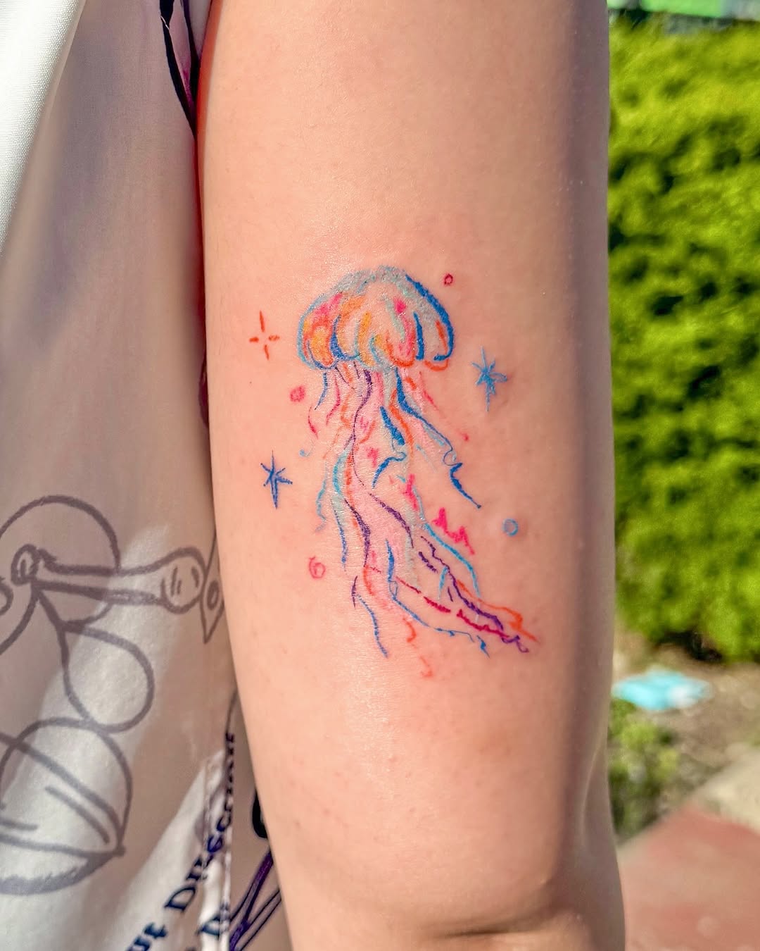 Vibrant jellyfish tattoo with colorful details Tattoo on skin