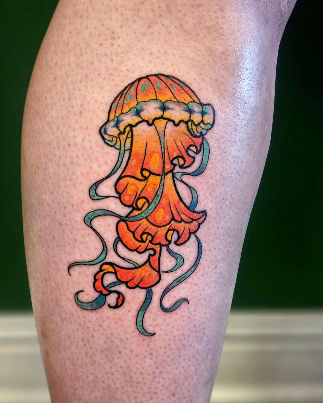 Whimsical Jellyfish Tattoo in Bright Colors Tattoo on skin