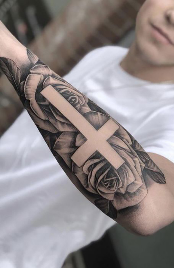 Blank Cross Tattoo Outline with Floral Background Tattoo on skin
