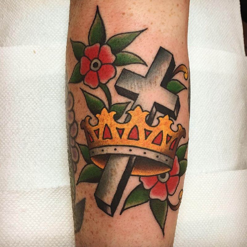 Colorful 3D Cross Tattoo with Flowers and a Crown Tattoo on skin