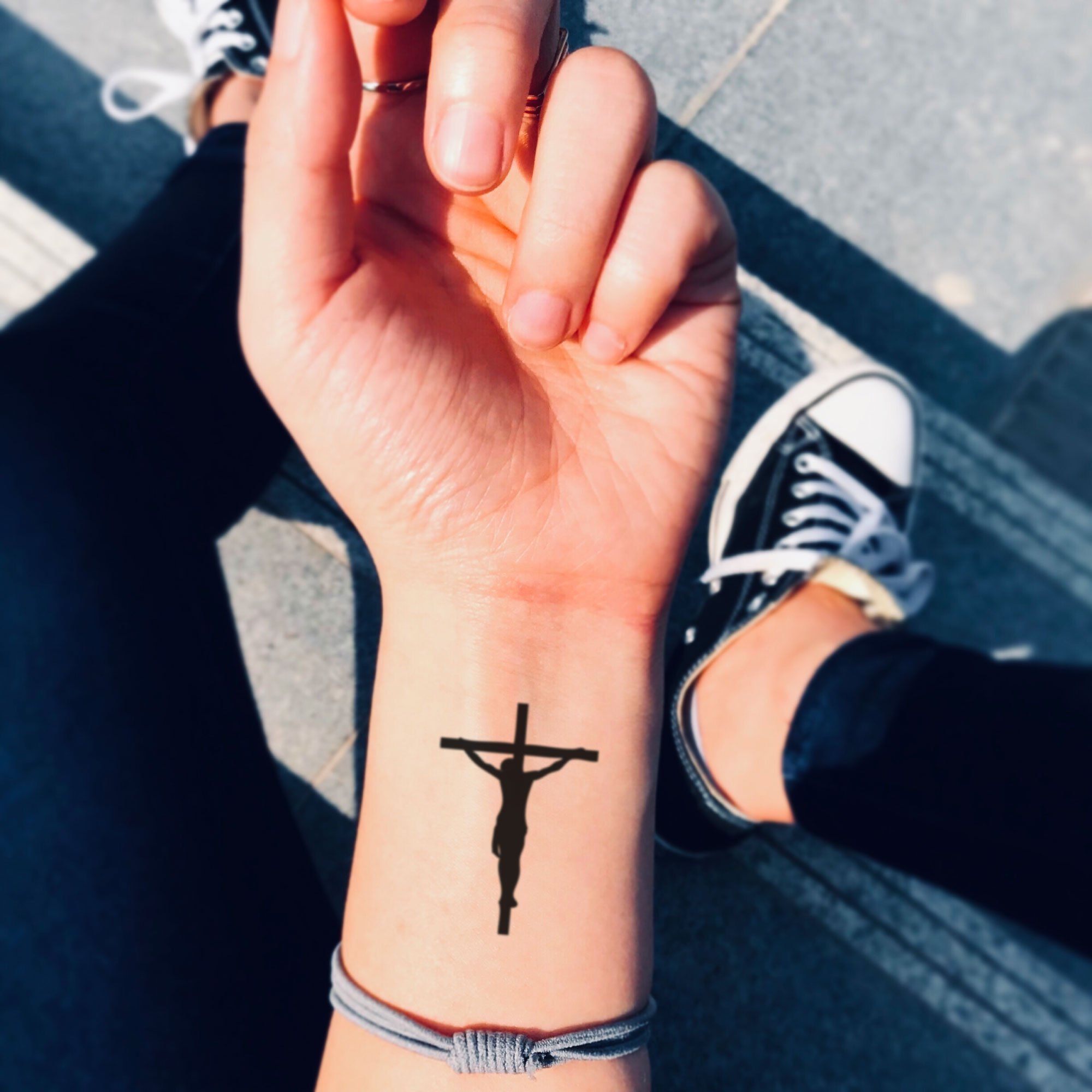 Plain Wrist Cross Tattoo Black Tattoo on skin