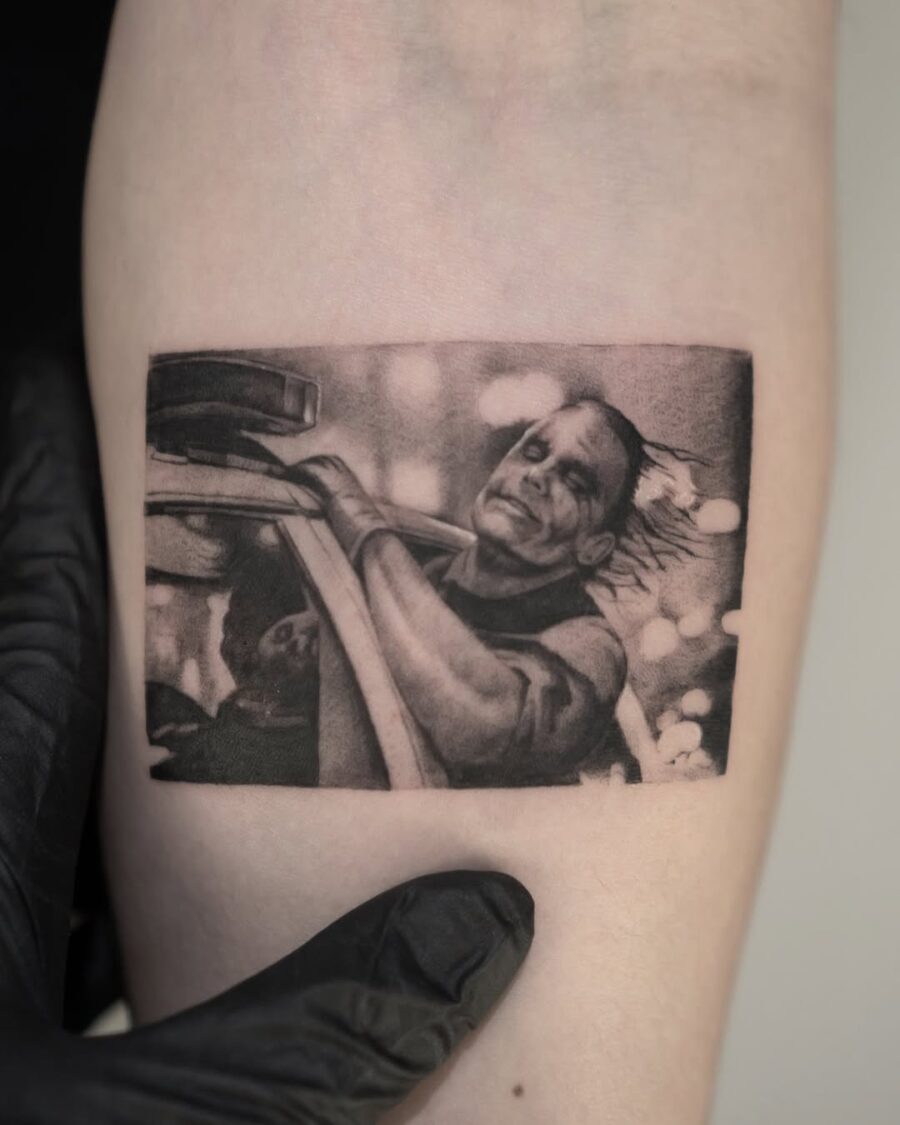 Dramatic Joker Scene Tattoo in Black and Gray Tattoo on skin