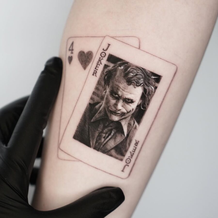 Intricate Joker Tattoo Inspired by Playing Cards Tattoo on skin