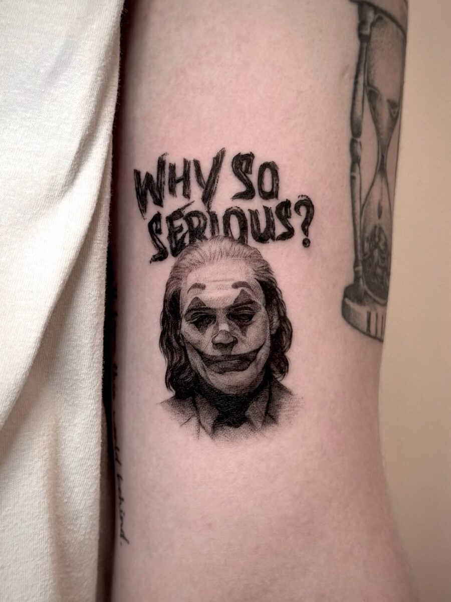 Intricate Joker Tattoo with Iconic Phrase Tattoo on skin