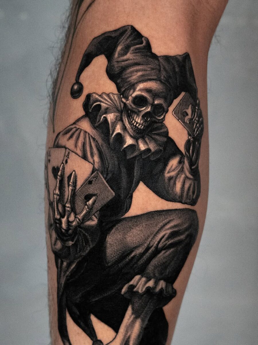 Intricate skull jester tattoo design Tattoo on skin